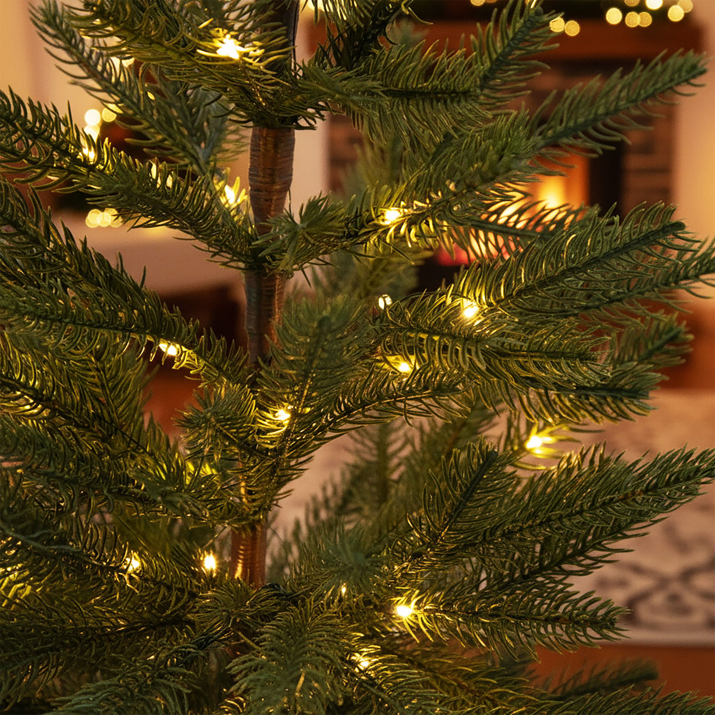 Künstlicher Weihnachtsbaum im Topf 60 cm mit Lichterkette batteriebetrieben - 30 LED - Deko Tannenbaum im Blumentopf warm weiß beleuchtet mit Timer